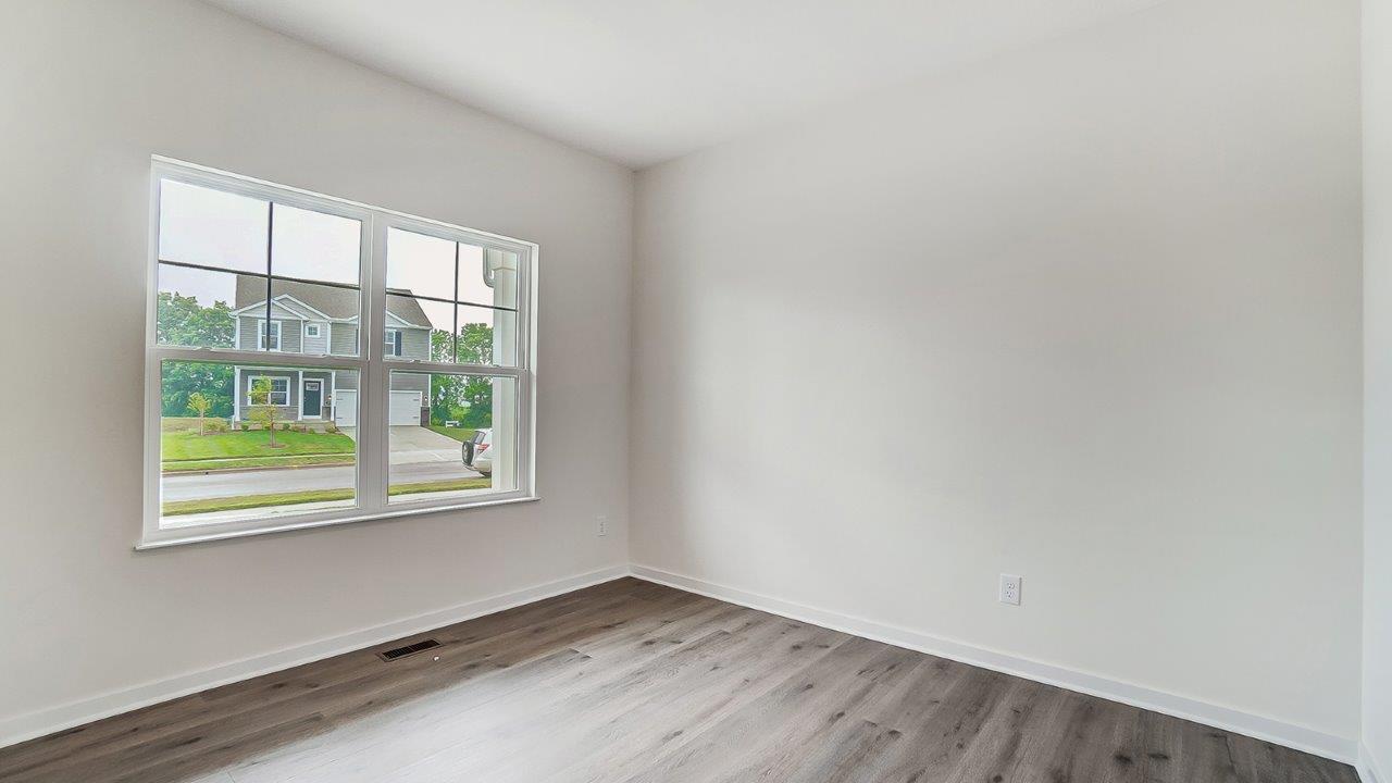 D.R. Horton stylishly designed front entry dining area in Lansdowne Farms new construction residence