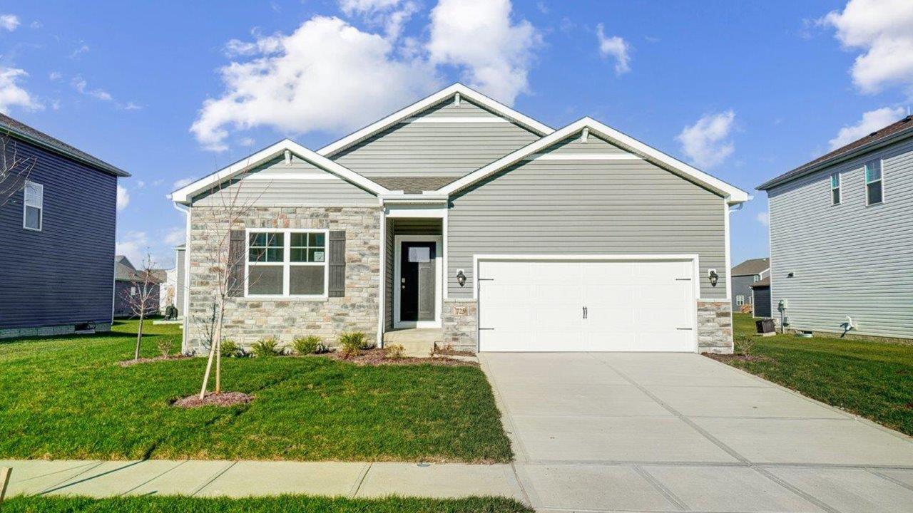Lansdowne Farms  front porch, main door accessing the entrance in the home, and main floor living areas