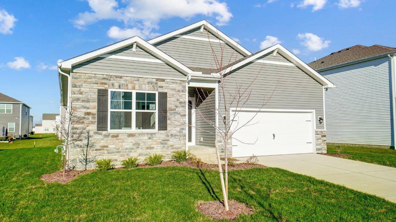 Front Covered Door, 2-car garage, porch-new residence, bring you home to this well-crafted and designed home