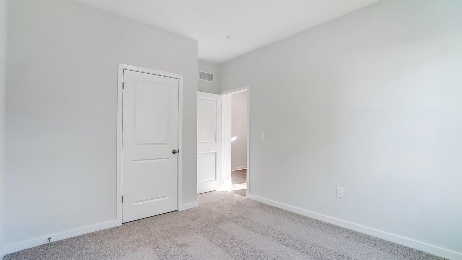 Secondary bedroom, flex-office, study, entertainment, game, craft room options in this D.R. Horton new construction home