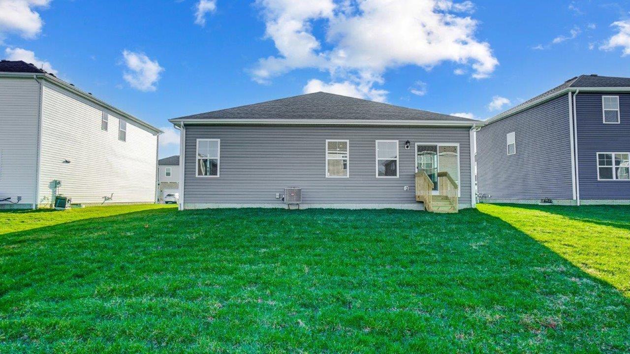 New House by D.R. Horton featuring access and seating, grill setup, and a transition from indoor to outdoor living