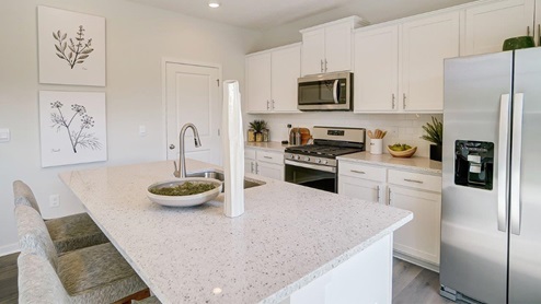 kitchen island and white cabinetry