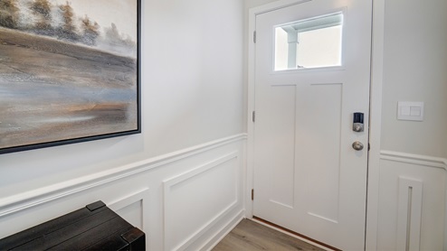 front entry way with wall trim