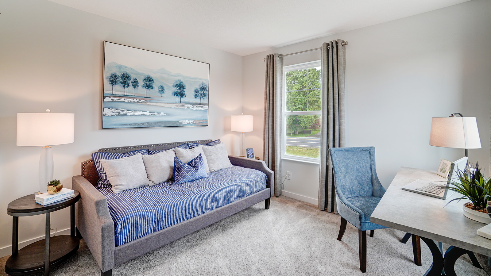 fourth bedroom with daybed, nightstands and desk with chairs