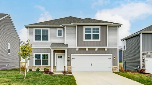 two story home with grey siding, covered entry and two car garage