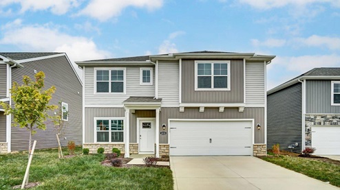 two story home with grey siding, covered entry and two car garage