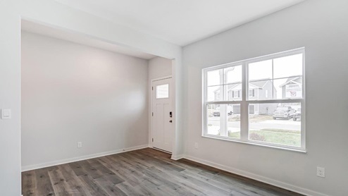 foyer and flex office space with double window