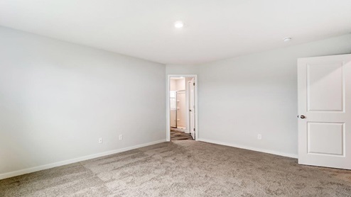 primary bedroom entry and ensuite bath