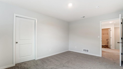 third bedroom closet and entry