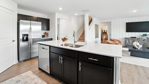 built in island with stainless steel appliances