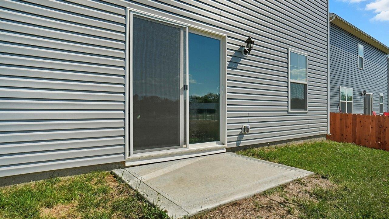 rear sliding door and concrete pad