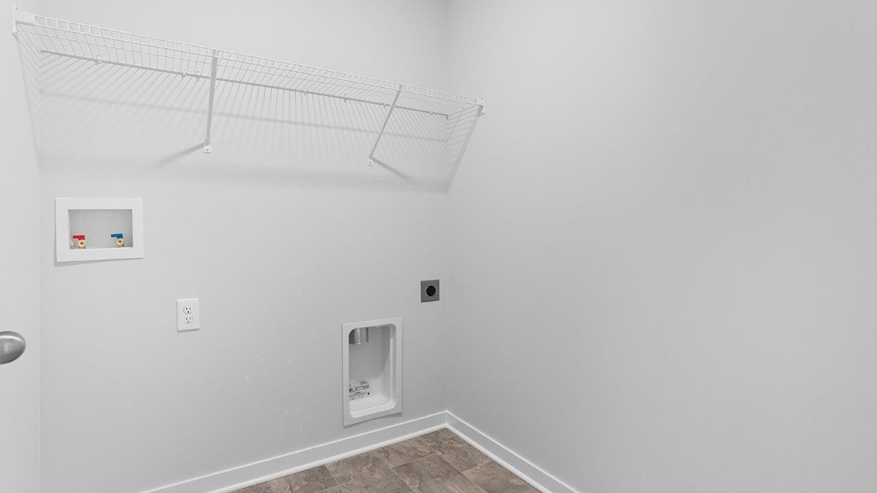 laundry room with wire shelving