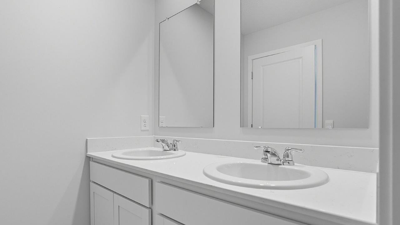 second full bathroom with double vanity