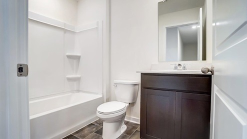 second full bath vanity, toilet and bath tub