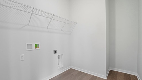 laundry room with wire shelving