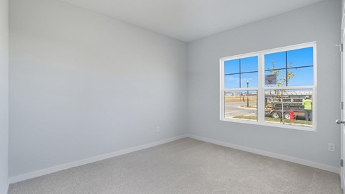 primary bedroom with double window
