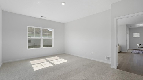 third bedroom with double window and entry