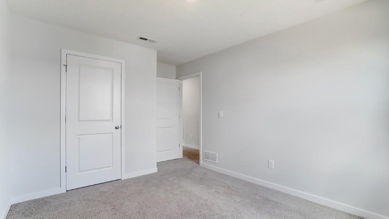 third bedroom closet and entry