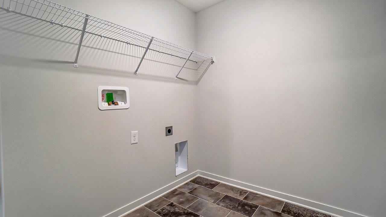 laundry room with wire shelving