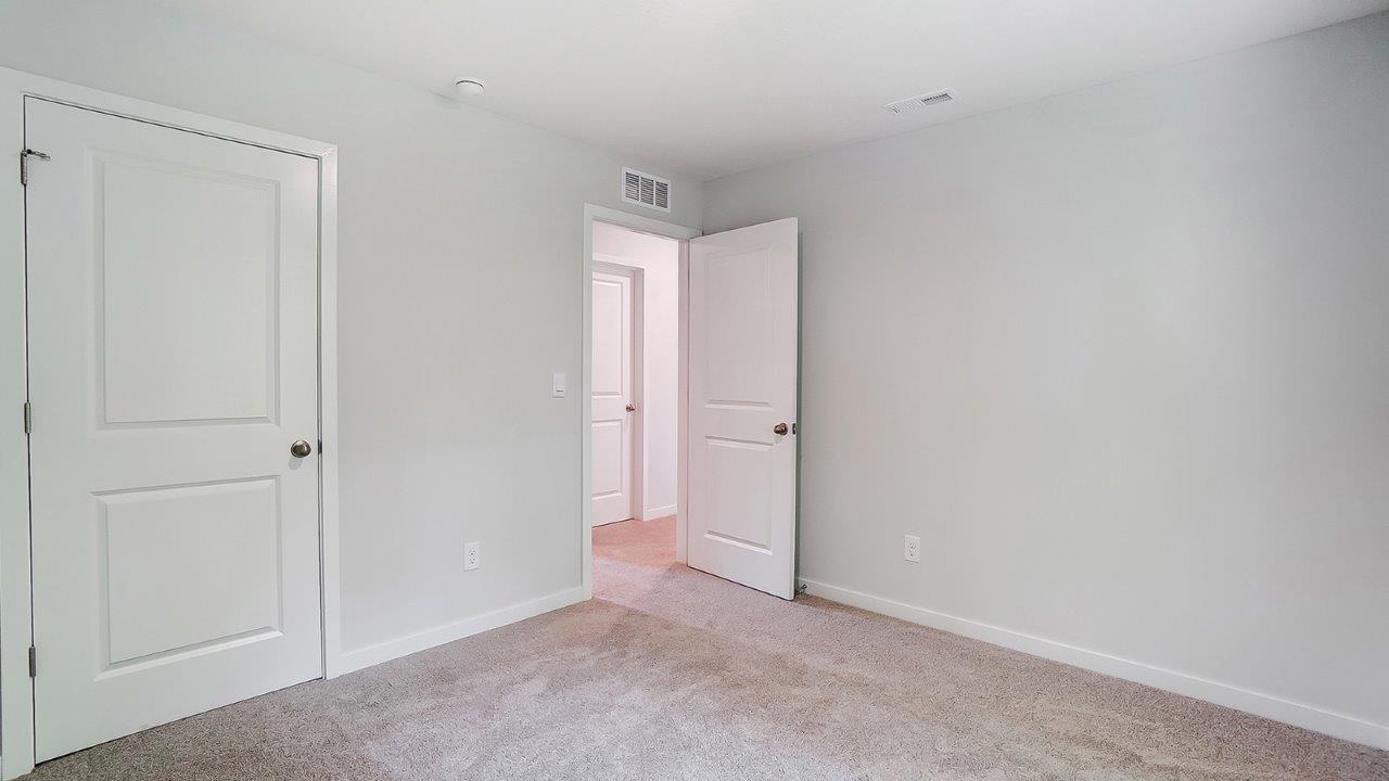 third bedroom closet and entry