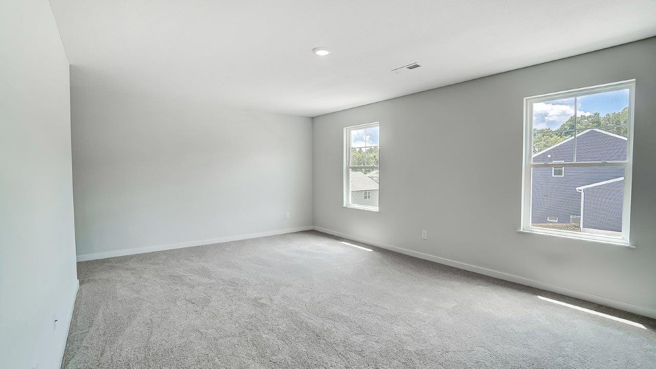 primary bedroom with single windows