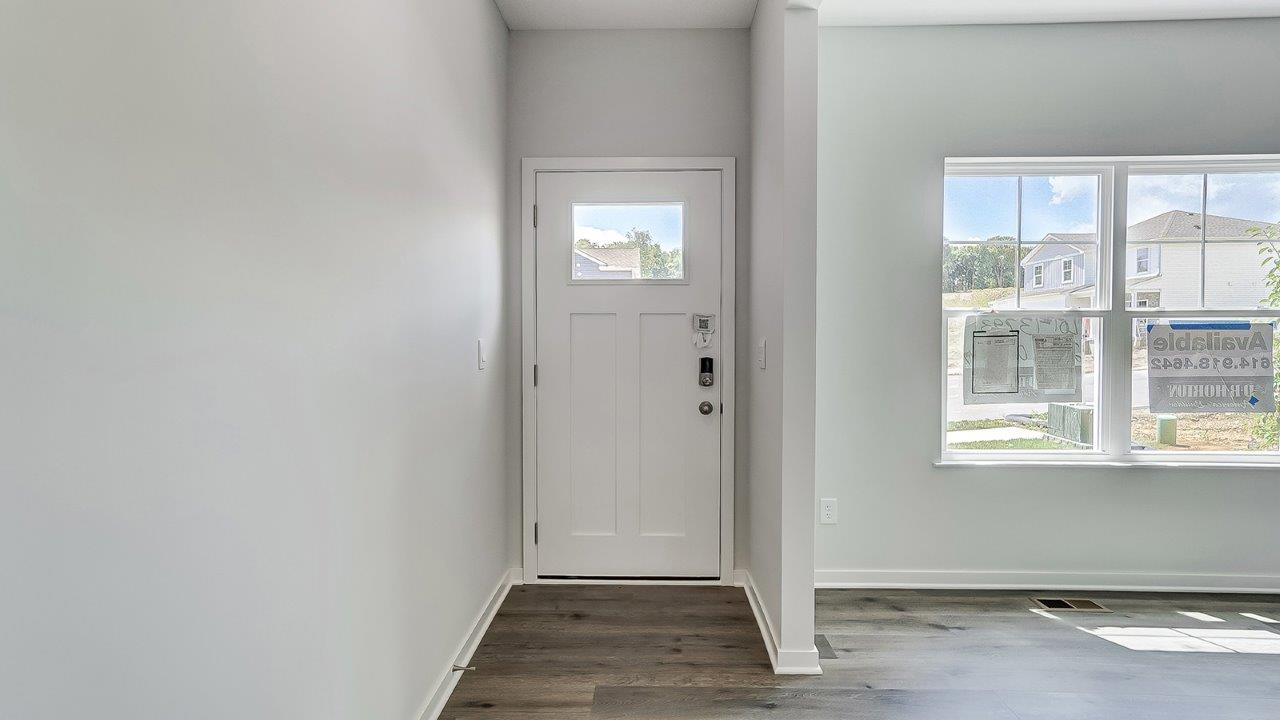 foyer and flex office space with double window