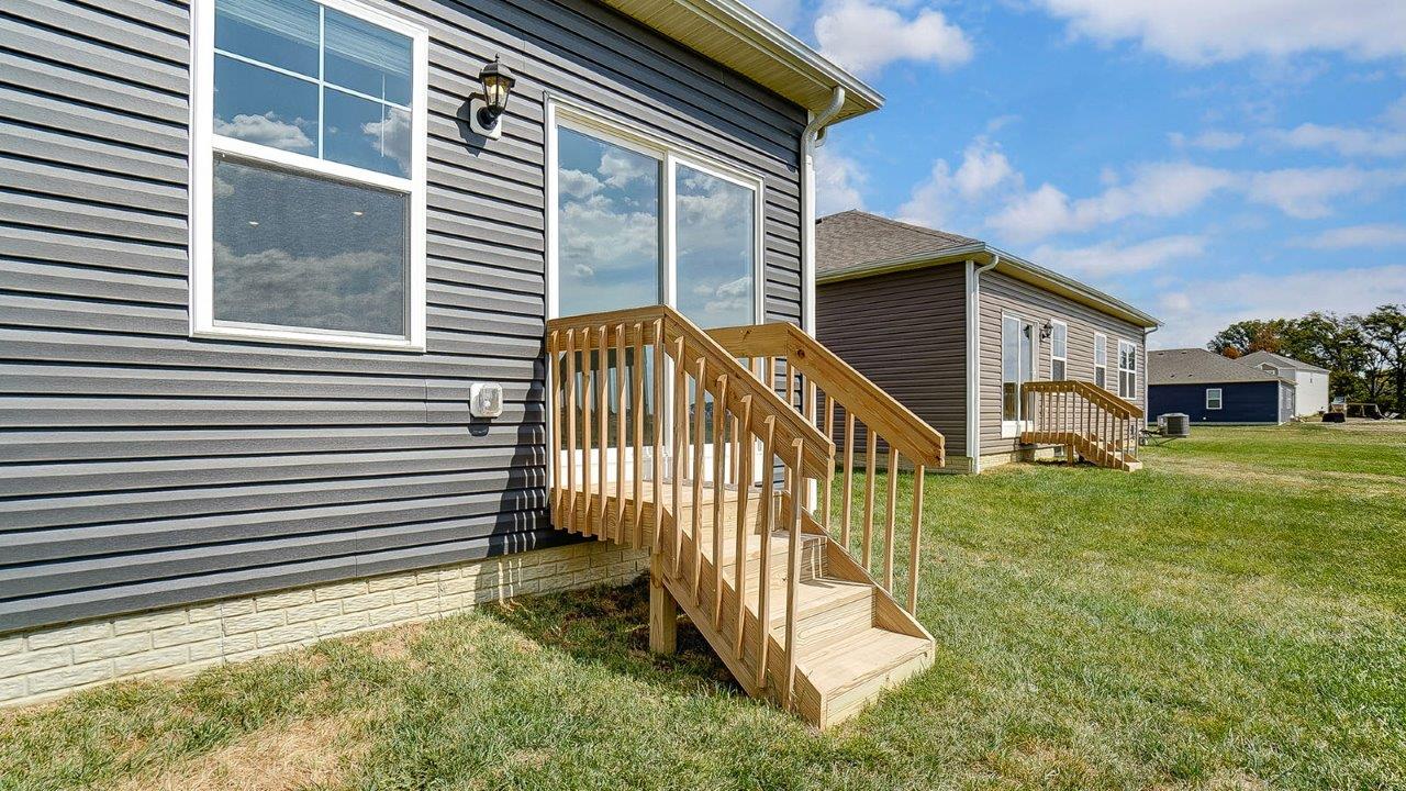 rear sliding door with steps to grade