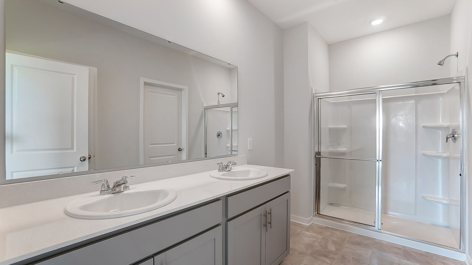 ensuite bath with double vanity and walk in shower