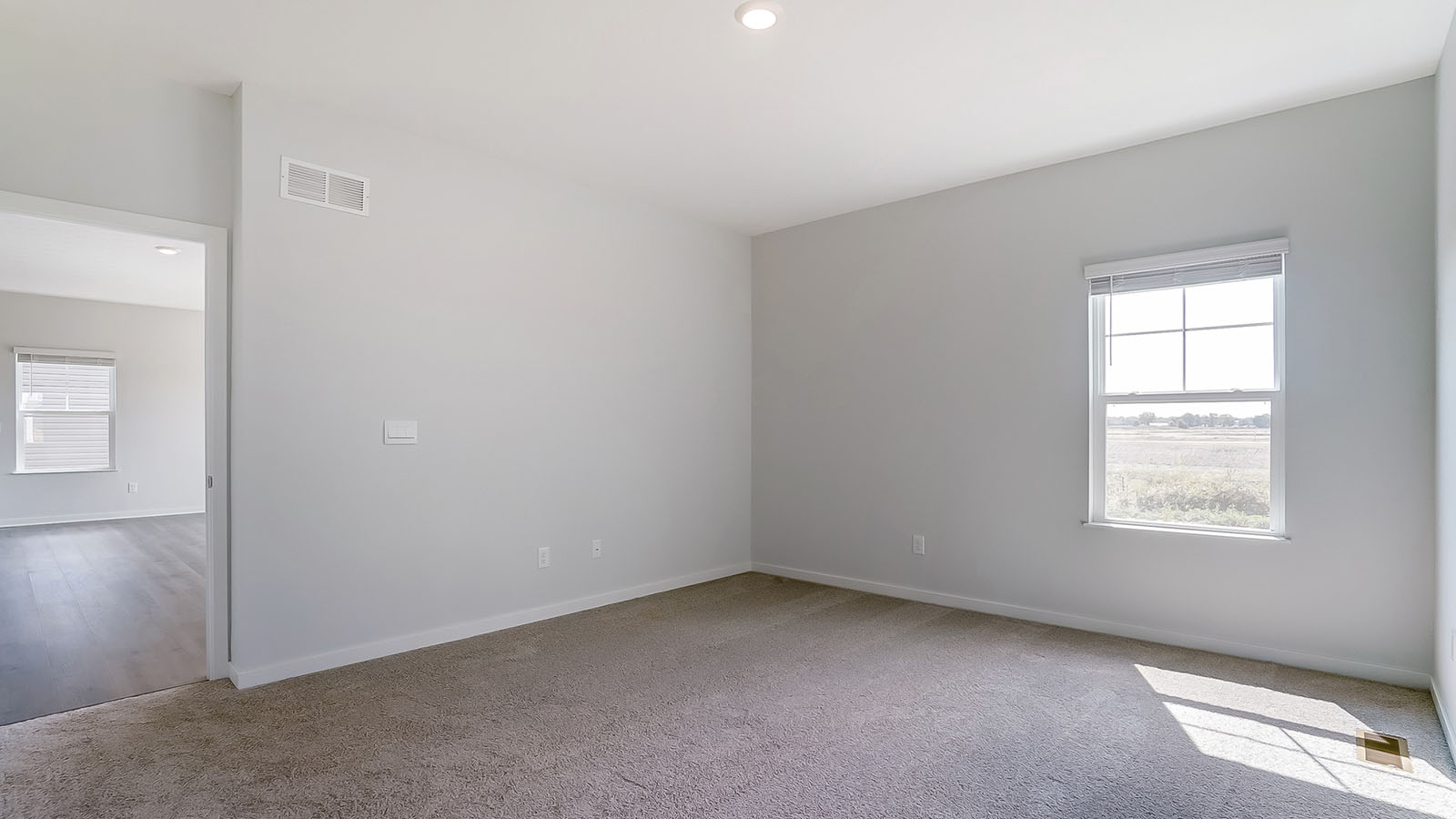 primary bedroom entry and single window