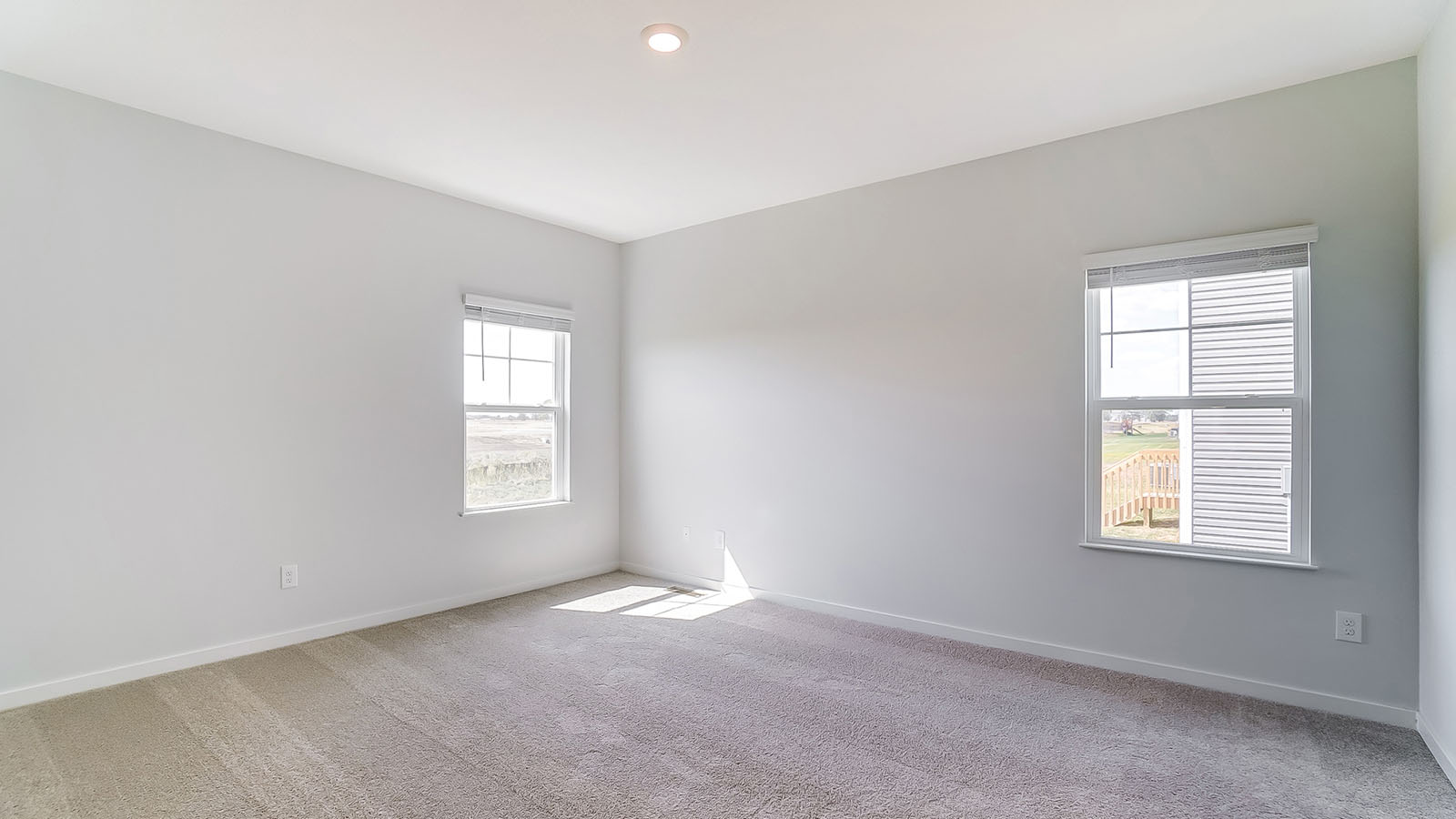 primary bedroom with single windows