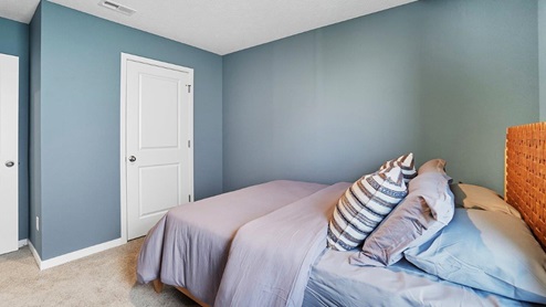 furnished third bedroom closet