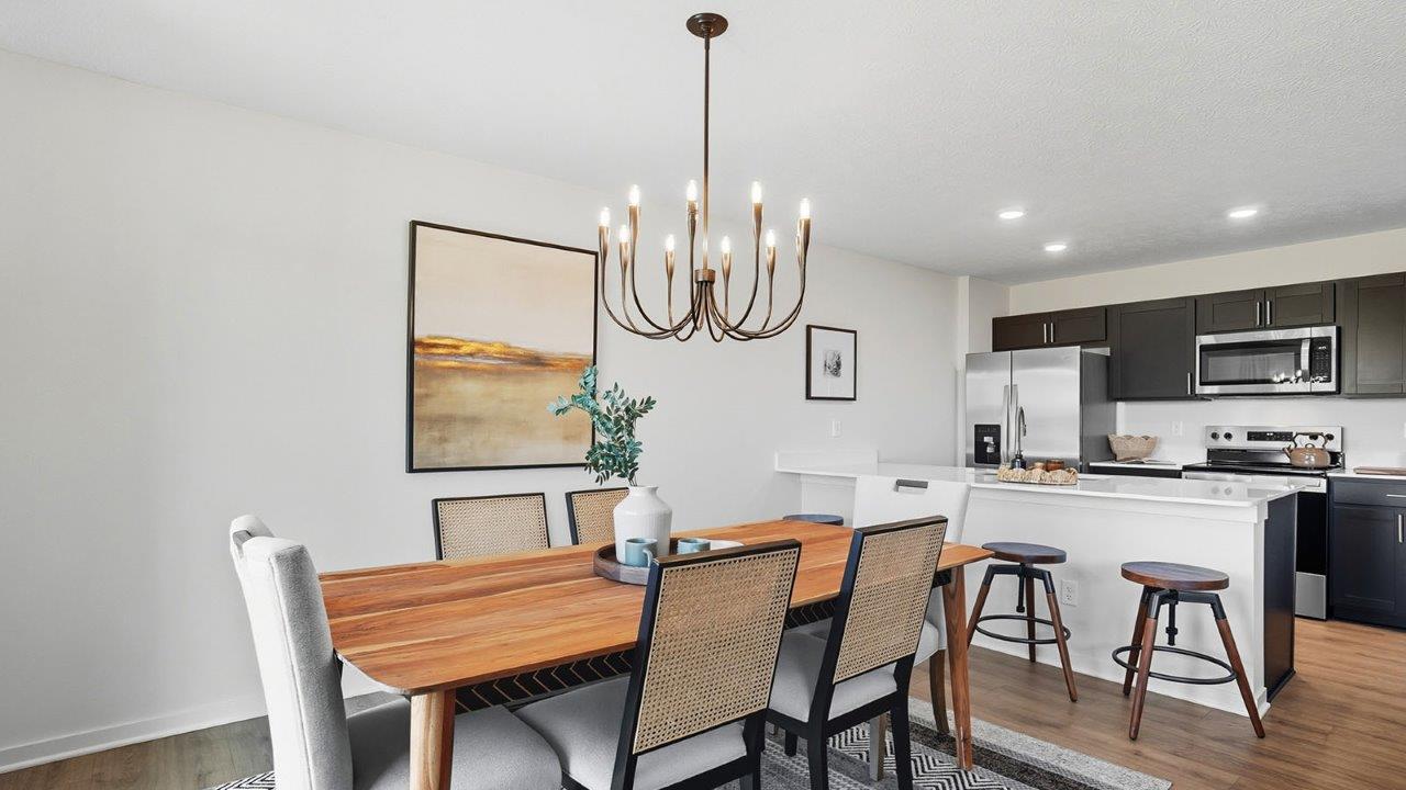 dining room with table and chairs, kitchen