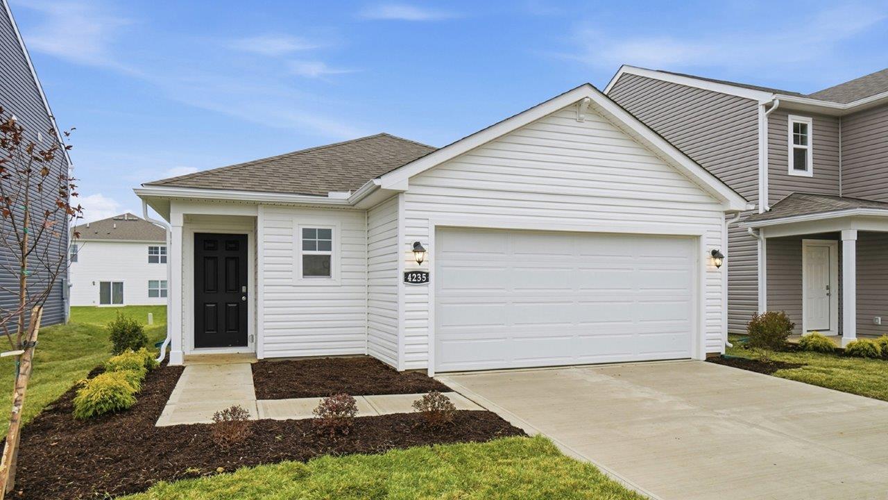 single story home with white siding and black front door, covered entry and two car garage