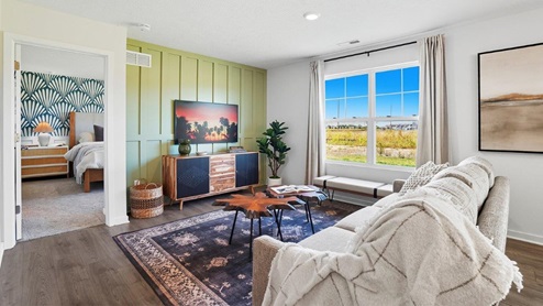 furnished great room with double window
