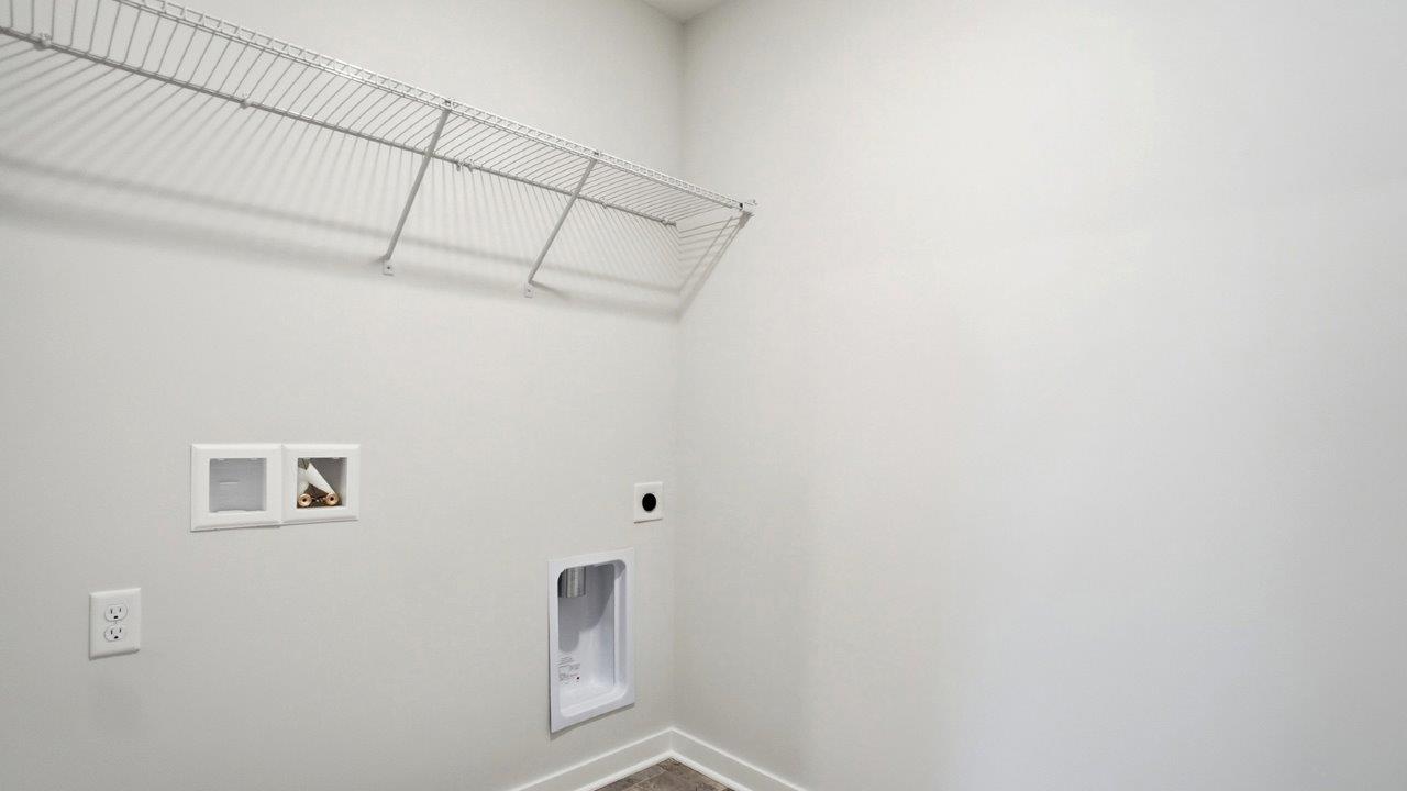 laundry room with wire shelving
