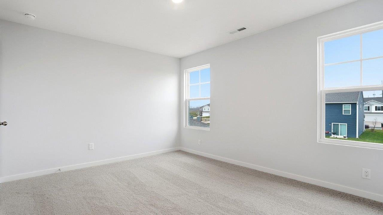 primary bedroom with single windows