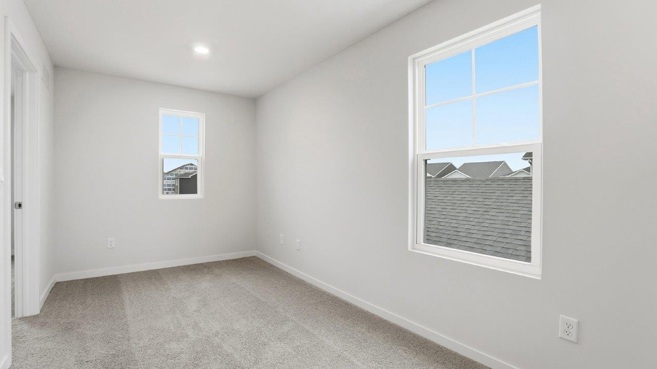 second floor landing with two windows