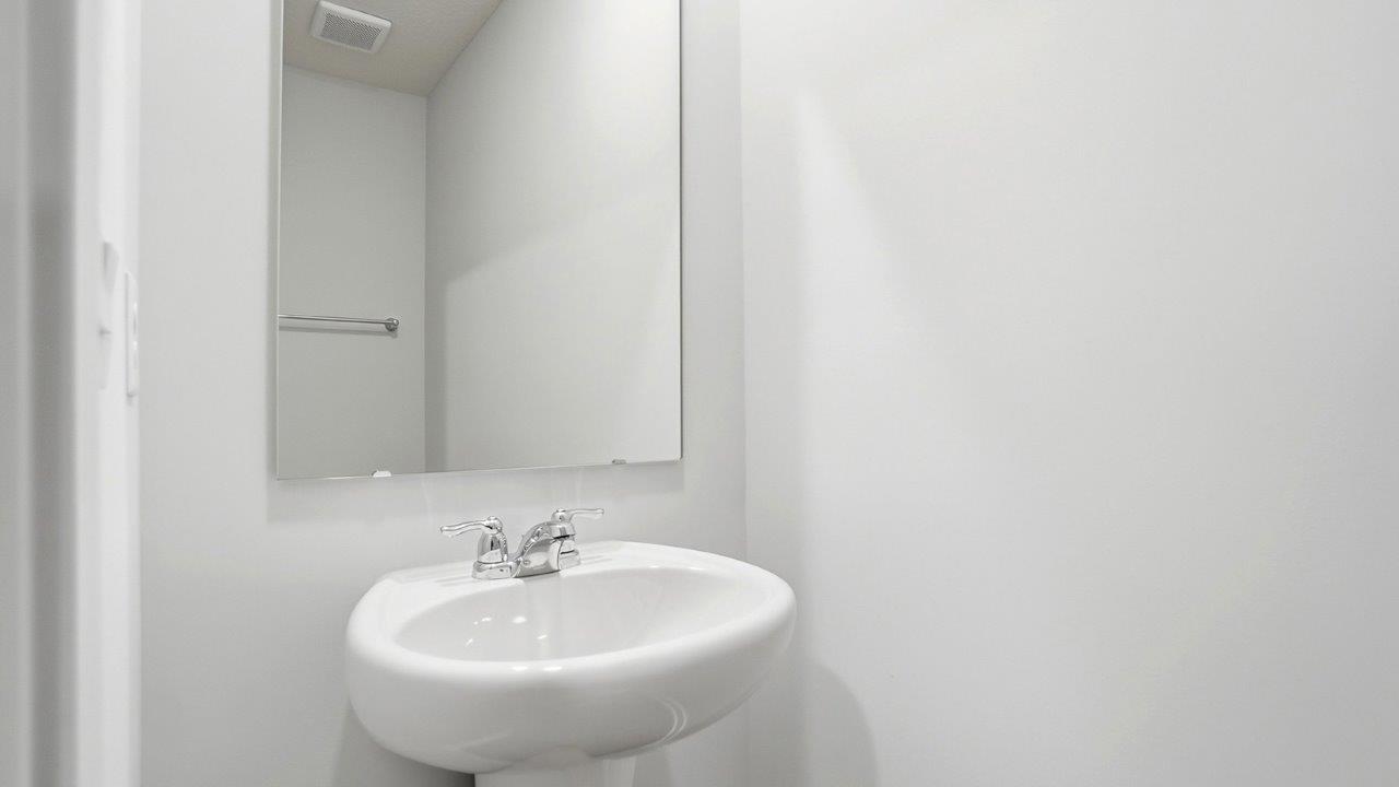 first floor powder room pedestal vanity