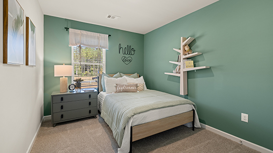 furnished third bedroom with single window