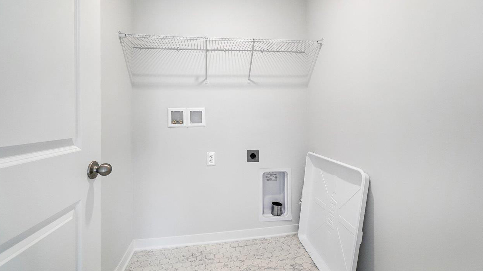 laundry room with wire shelving