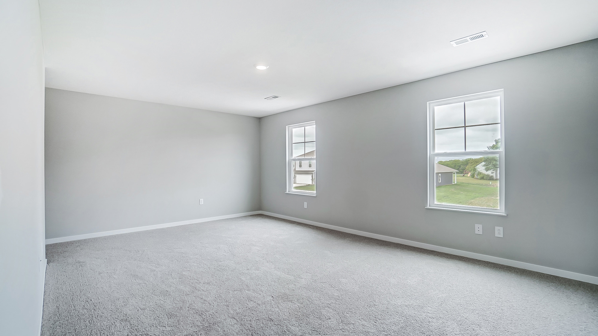 primary bedroom with single windows