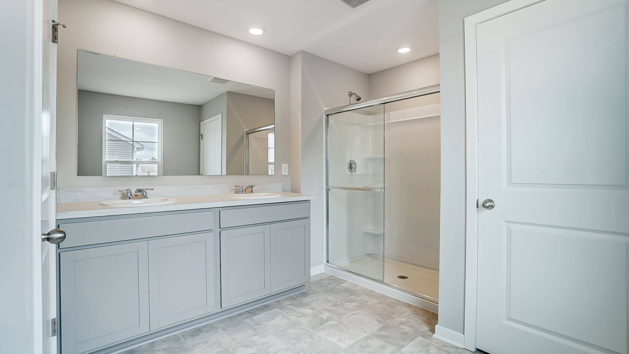 ensuite with double vanity and walk in shower