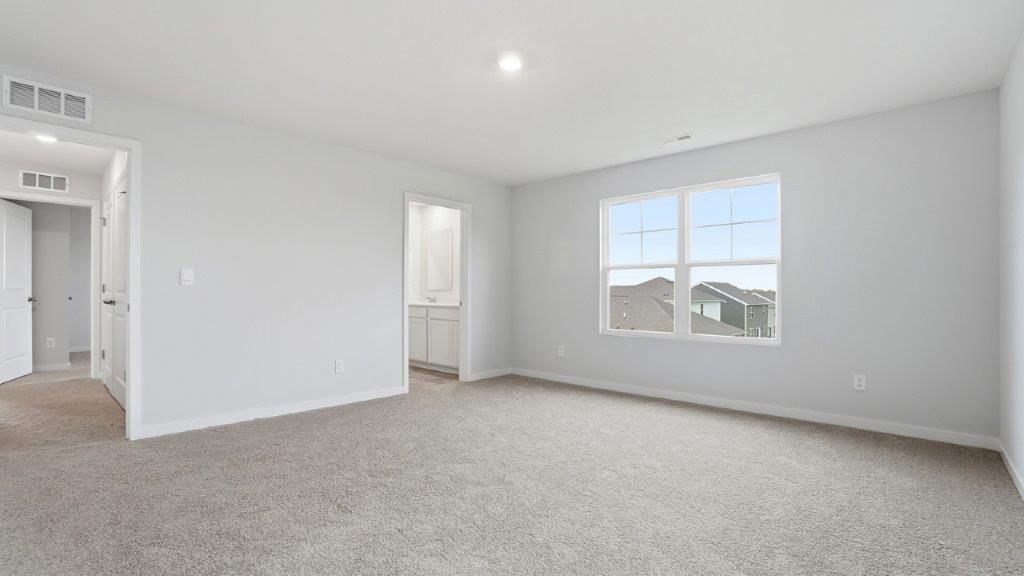 primary bedroom entry and ensuite bath