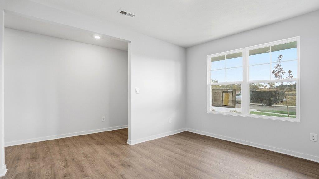 office space with double window and foyer