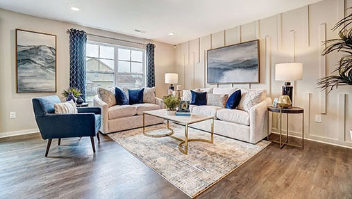 furnished great room with double window