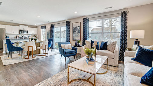 furnished great room, dining and kitchen