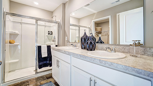 ensuite bath with double vanity and walk in shower