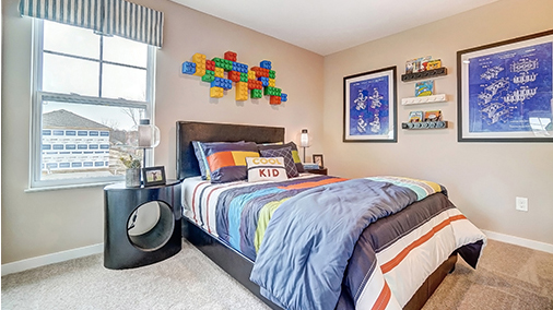 furnished second bedroom with single window