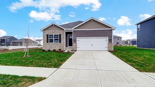 single story home with brown siding, partial stone front, two car garage - Aldridge floor plan