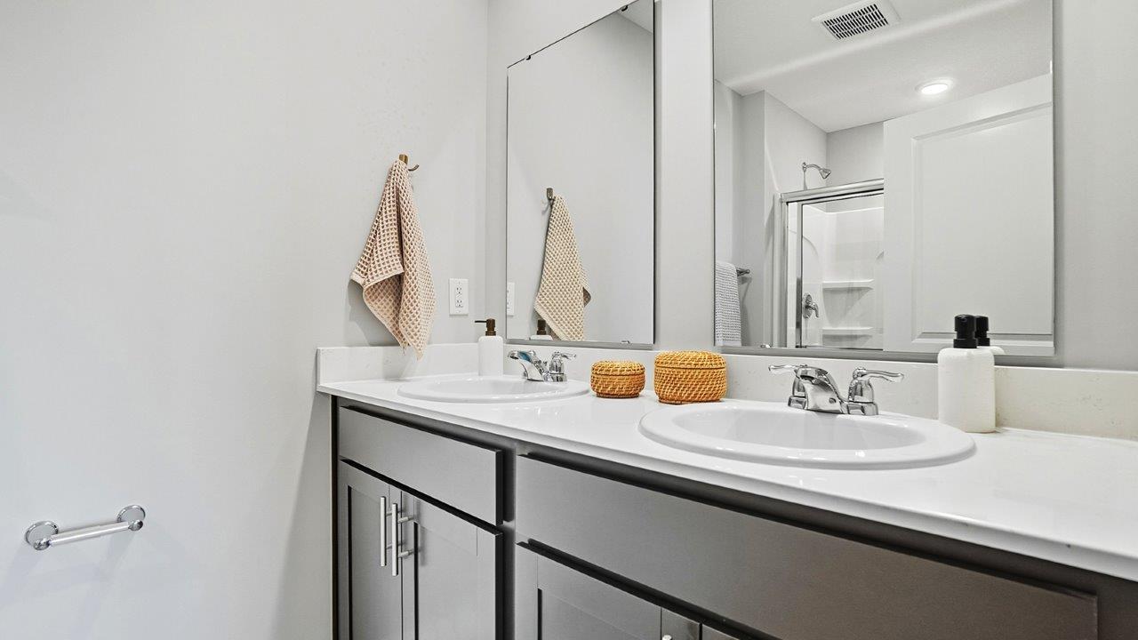 Primary Bathroom w/ dark cabinets